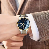 Herrenuhr Armbanduhr Stahl-Gold. Elegantes Design mit dunkelblauem Ziffernblatt